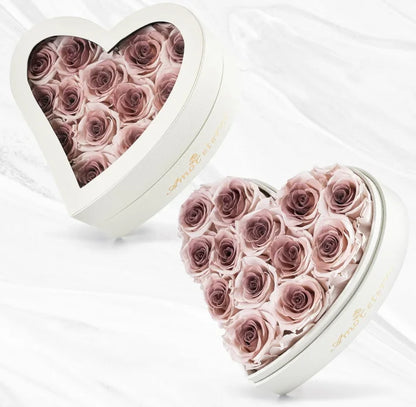 Big heart shaped box filled with multicolored roses
