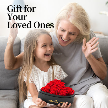 Big heart shaped box filled with multicolored roses